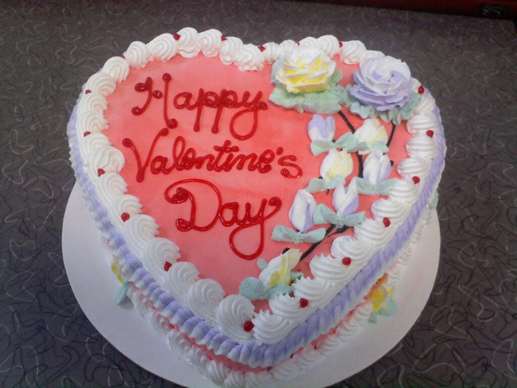 Heart-shaped ice cream cake decorated for Valentine's Day