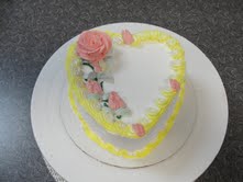 Small yellow heart-shaped ice cream cake